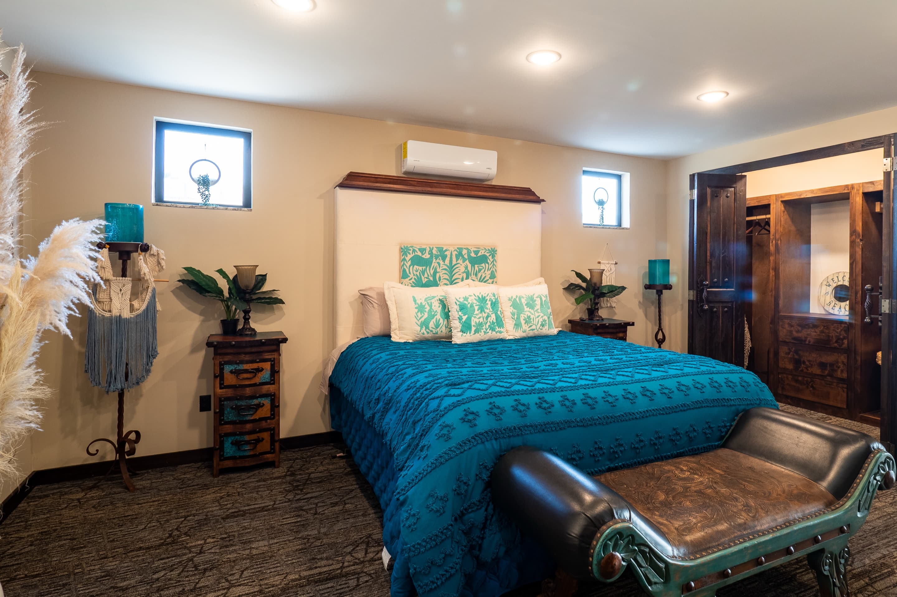 Bedroom with coastal decor and teal bedding
