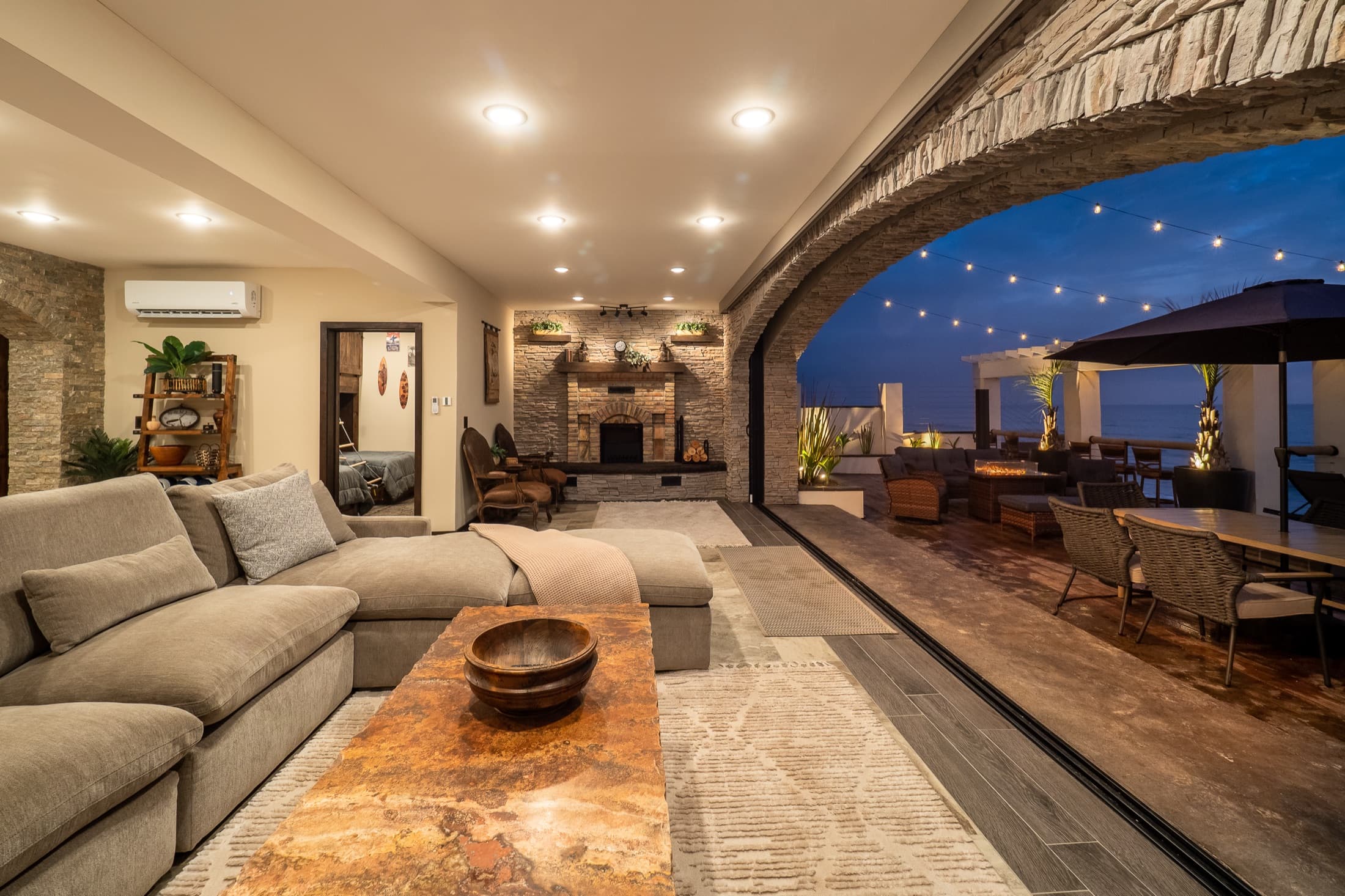 Living room opening onto the ocean-view deck